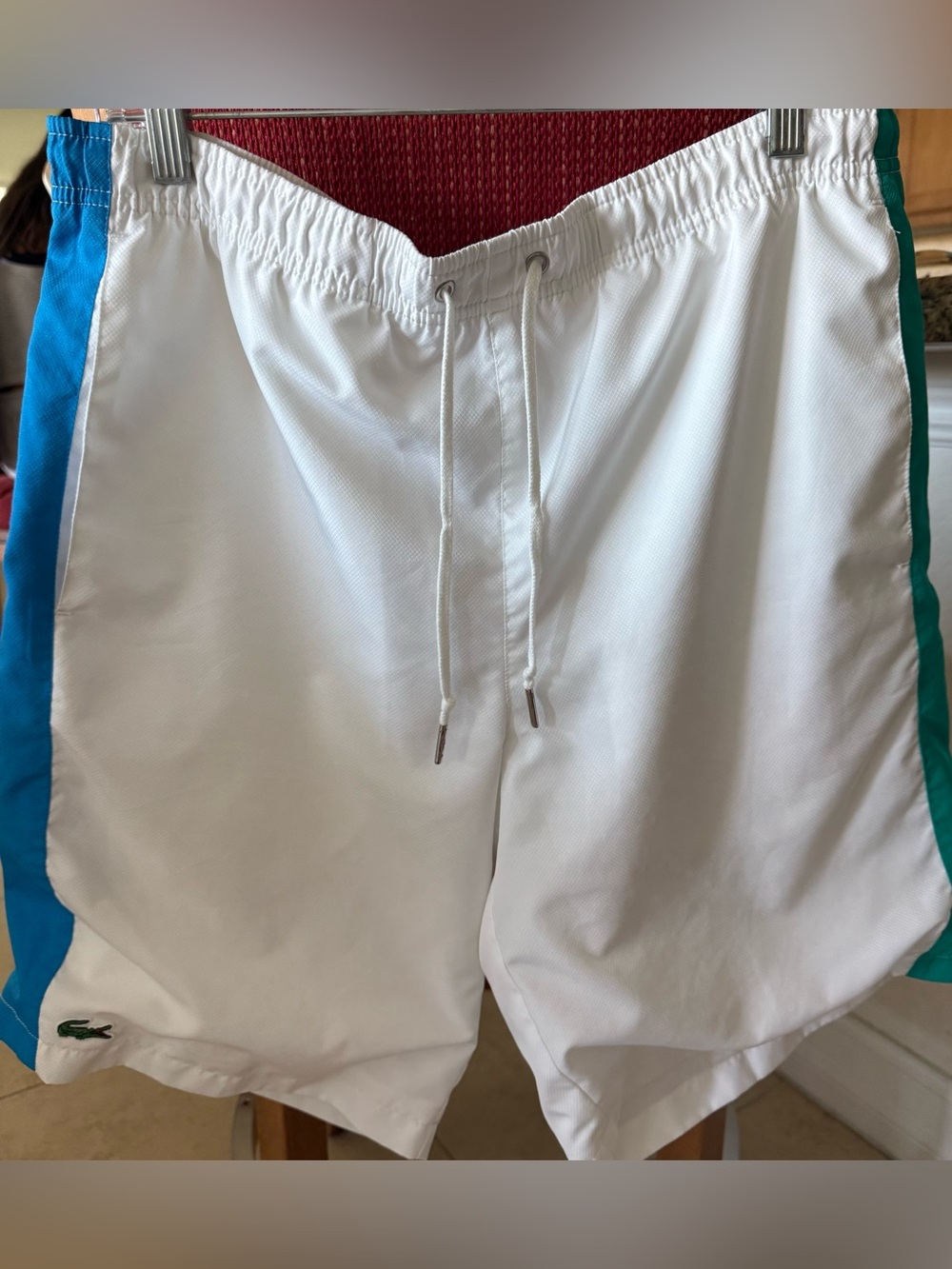 Lacoste White Tennis Shorts with Blue-Green Side Panels
